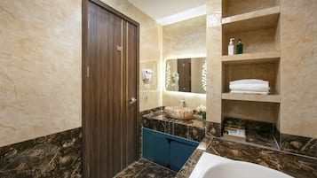 Separate bathtub and shower, rainfall showerhead, designer toiletries