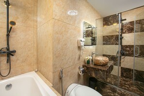 Separate bathtub and shower, rainfall showerhead, designer toiletries
