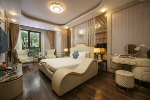 Chambre Deluxe, vue ville | Literie de qualité supérieure, surmatelas, minibar