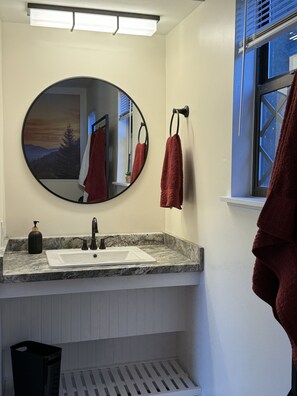Shower, towels, soap, shampoo