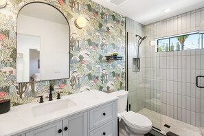 Shower, eco-friendly toiletries, hair dryer, towels