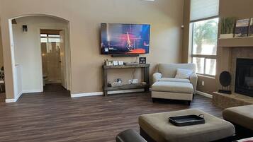 Smart TV, fireplace, foosball