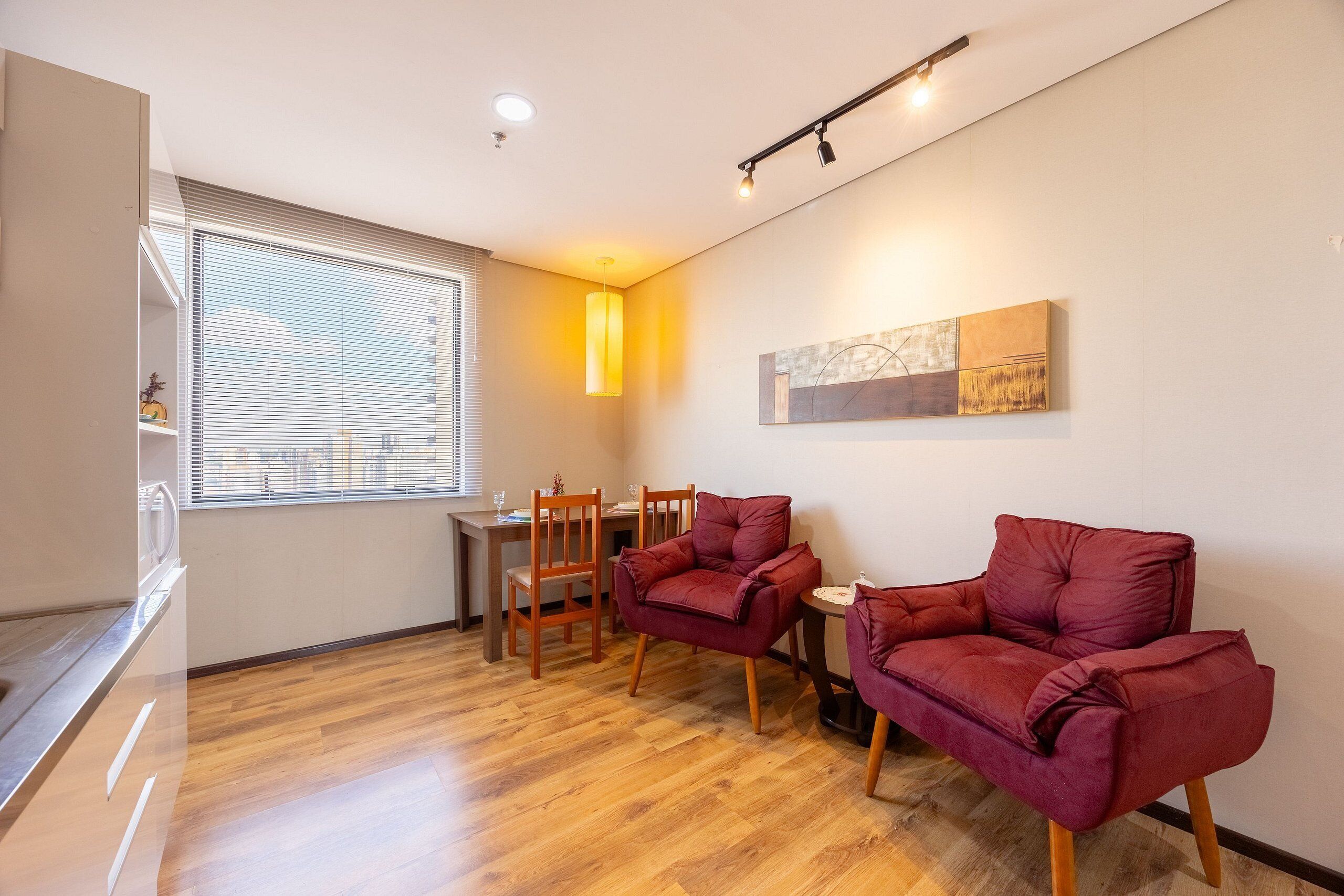 Comfort Apartment | Living area | 26-inch plasma TV with digital channels