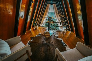 Cabin, 1 Queen Bed, Non Smoking, Jetted Tub | Living area | 42-inch Smart TV with digital channels, fireplace - CABANAS COFFEE HUTS (Picada Cafe)