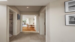 A hallway leading to a dining area with a view of the outdoors. - Villa Pietra Cattunara (Brtonigla)