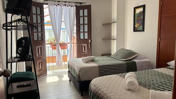 Hypo-allergenic bedding, pillow-top beds, iron/ironing board, free WiFi