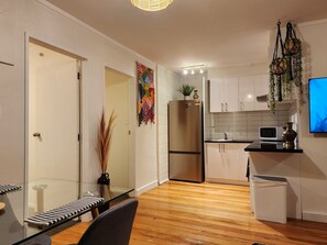 City Apartment | Private kitchen | Full-size fridge, microwave, oven, stovetop