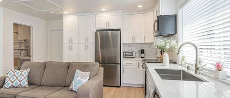 Fridge, dishwasher, cookware/dishes/utensils