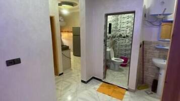 Shower, bidet, towels, soap
