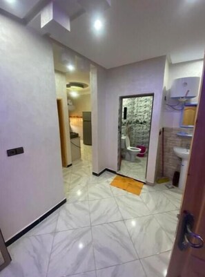 Shower, bidet, towels, soap