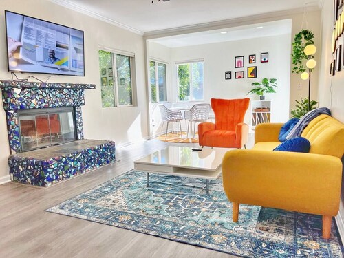 Welcome to our vibrant 2-bedroom, 1-bathroom abode, where retro charm meets modern comfort.