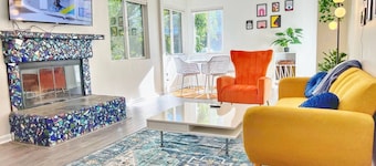 Welcome to our vibrant 2-bedroom, 1-bathroom abode, where retro charm meets modern comfort.
