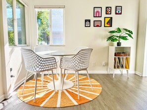 Dining - Welcome to our vibrant 2-bedroom, 1-bathroom abode, where retro charm meets modern comfort. (San Diego)