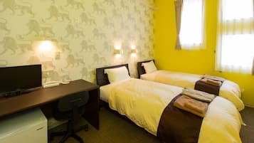 Basic Twin Room | Desk, laptop workspace, free WiFi, bed sheets