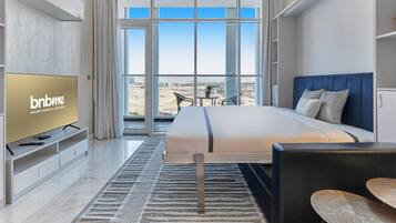 Deluxe Studio | Premium bedding, in-room safe, iron/ironing board, free WiFi