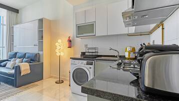 Deluxe Studio | Premium bedding, in-room safe, iron/ironing board, free WiFi