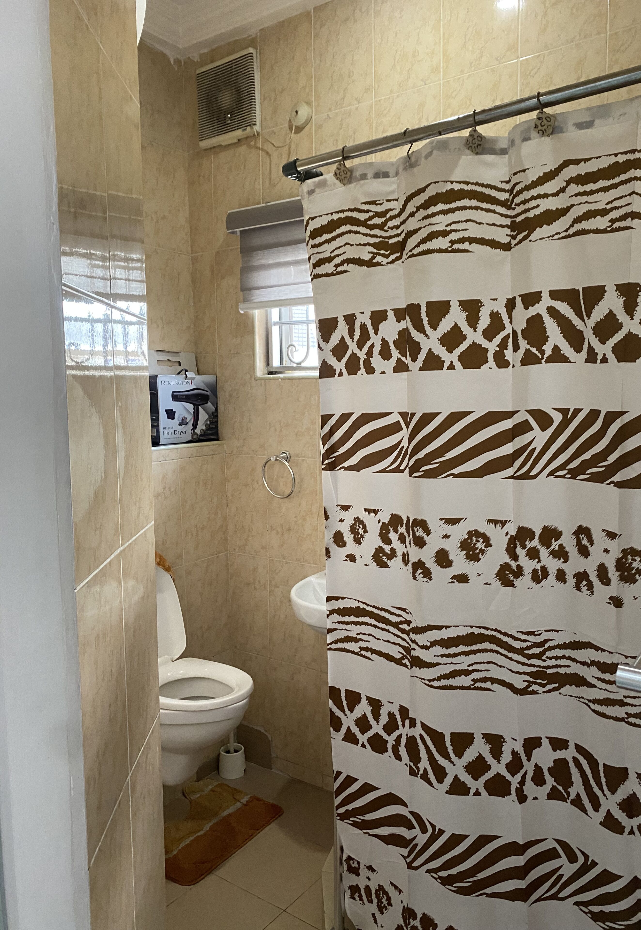 Hair dryer, towels, soap, shampoo