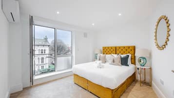 2 bedrooms, desk, iron/ironing board, travel cot