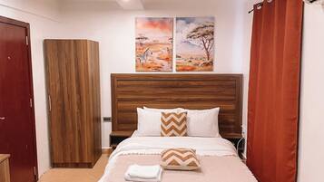 1 habitación, escritorio, tabla de planchar con plancha y wifi gratis