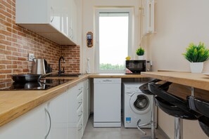 Private kitchen - Apartment With Three Bedrooms by Renters (Warsaw)