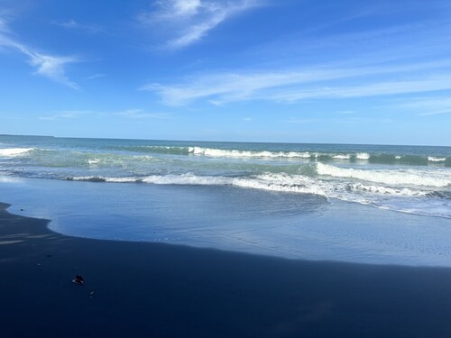 Rest , Restore, and Relax steps away from the beautiful black sands beach. 
