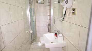 Junior Suite | Bathroom | Shower, rainfall showerhead, free toiletries, hair dryer