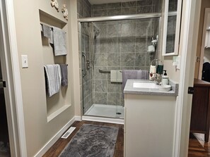 Shower, hair dryer, towels, soap