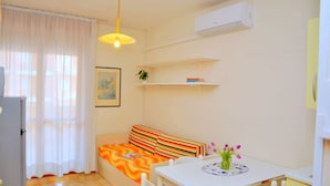 Apartment, 1 Bedroom, Balcony, Ocean View | Living room - One Bedroom Apartment With Stunning Side sea View (San Michele al Tagliamento)