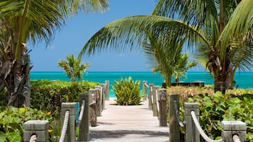 On the beach, sun loungers, beach towels
