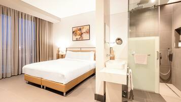 Suite, 1 Bedroom | Bathroom | Shower, free toiletries, hair dryer, bathrobes