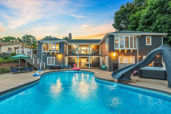 Your beautiful oasis to cool off & play with the kids on hot summer days. The slide will be a huge hit with kids and adults alike! You can even eat lunch next to the pool.