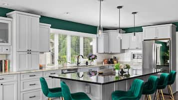 Coffee/tea maker, fridge, microwave, oven