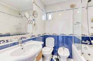 Hair dryer, bidet, towels, soap
