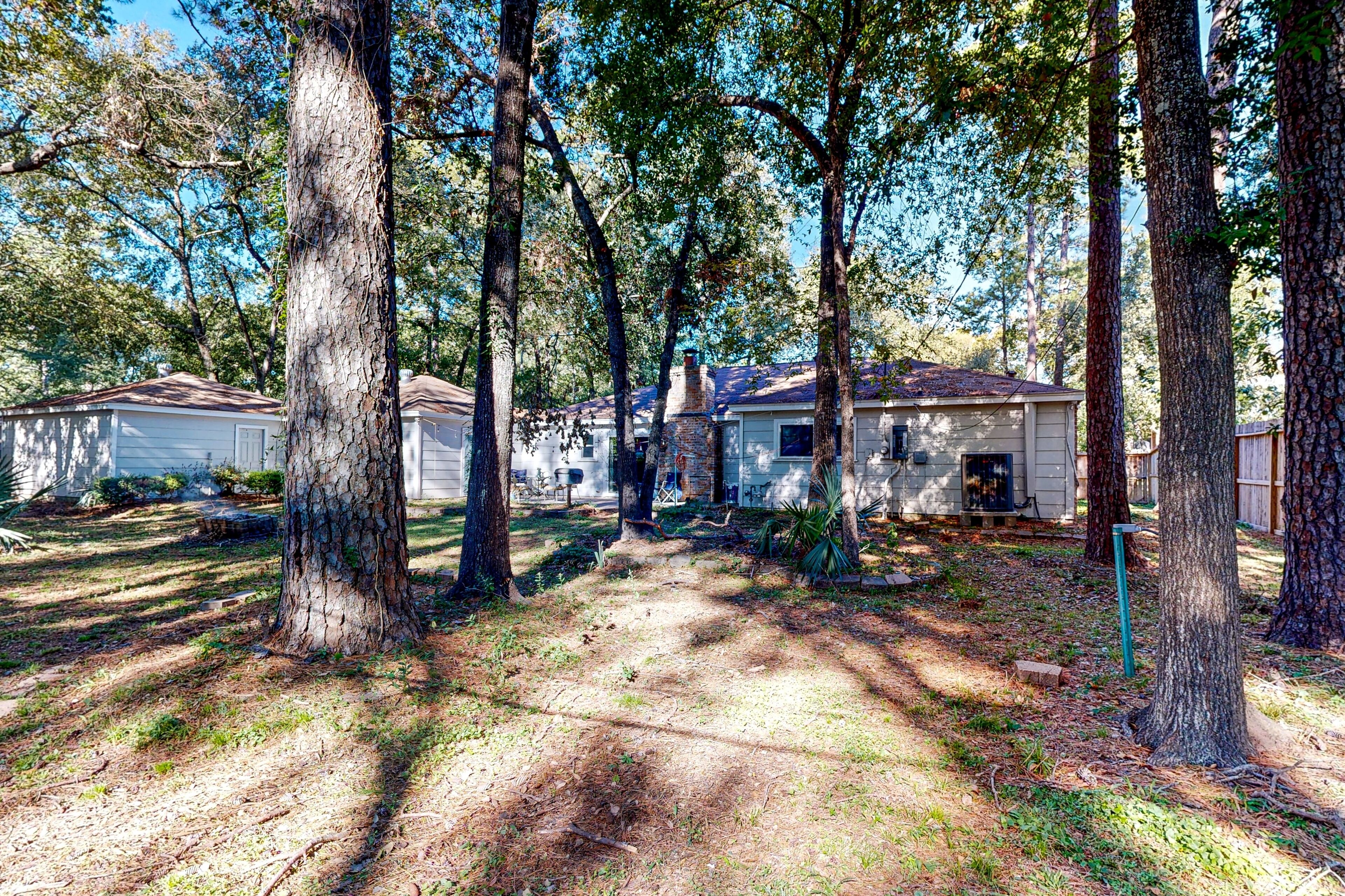 Dog-friendly home with large yard, firepit, home office, fireplace, & AC