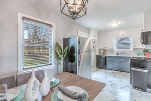Fridge, microwave, oven, stovetop - OneCozyPlace Tulsa | King Bed • Expo•TU • Downtown (Tulsa)