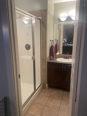 Shower, towels, soap, shampoo