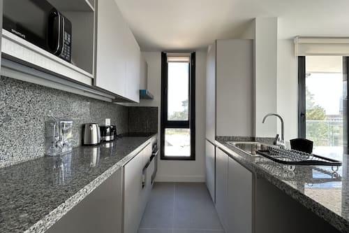 Family Apartment | Private kitchen | Full-size fridge, microwave, oven, electric kettle