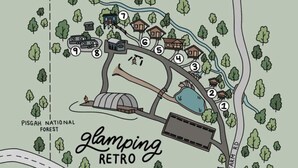 A campground with numbered sites, a large RV, and a lake. - The Turner Unit 1 - Glamping Retro (Erwin)