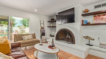 Smart TV, fireplace, foosball