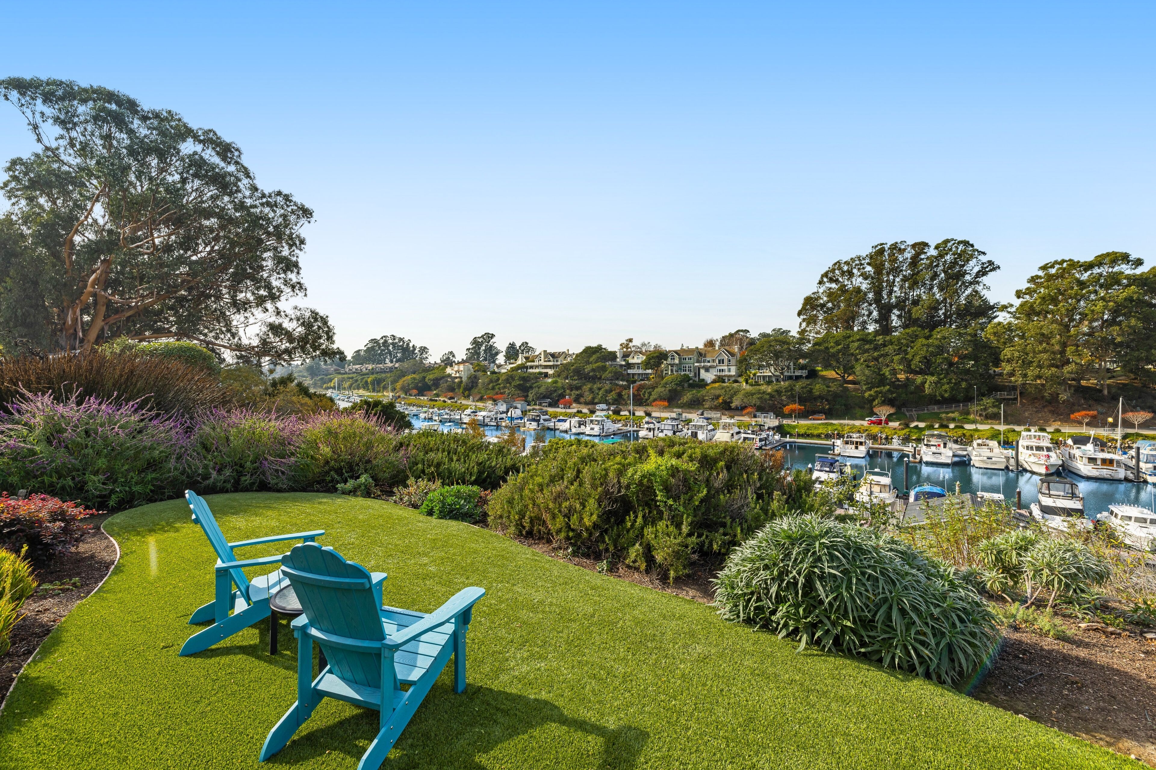 Enchanting waterfront home with hot tub, patio, & great harbor views