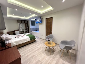 Quarto luxo, 1 quarto | Roupas de cama premium, edredons de pluma, frigobar