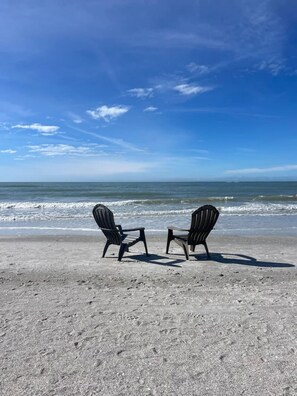On the beach, sun-loungers, beach towels