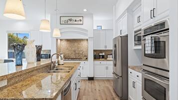 Villa | Private kitchen | Full-sized fridge, microwave, oven, stovetop