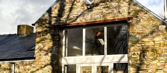 A converted barn, restored to the highest standards, on the outskirts of Solva, Pembrokeshire.