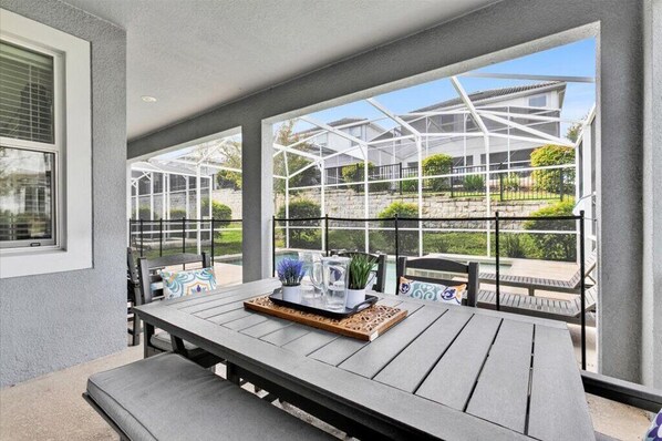 Outdoor dining - Family Friendly home near Disney. Private pool/spa. Resort amenities included (Davenport)