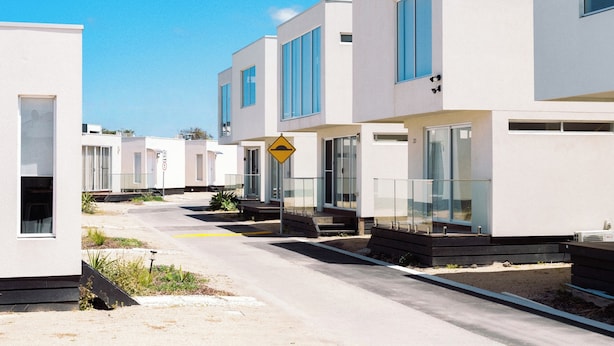 A modern residential area with contemporary houses featuring large windows and balconies. - Eden Bay Mornington (Capel Sound)