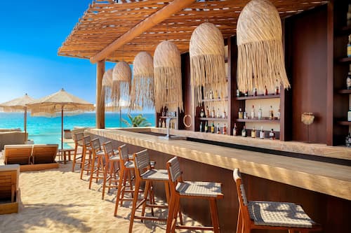 Private beach nearby, white sand, free beach shuttle, beach umbrellas
