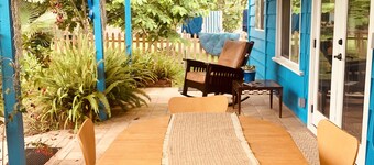 Charming beach cottage in a beautiful garden setting.