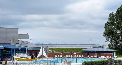 Appartement 'Fewo Strandmuschel' avec vue sur la mer, terrasse privée et Wi-Fi