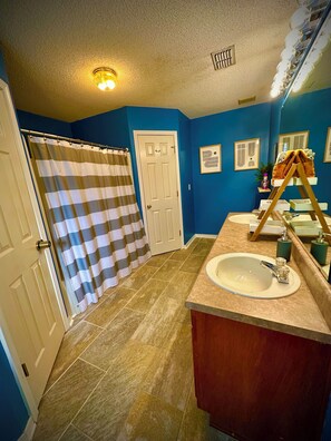 Hair dryer, towels, soap, shampoo